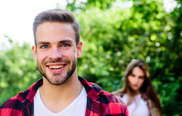 Fototapeta premium Follow me. Put yourself forward in way that is respectful to women while still being outgoing. Starting relationship. Couple relationship. Couple outdoors nature defocused. Couple in love meeting
