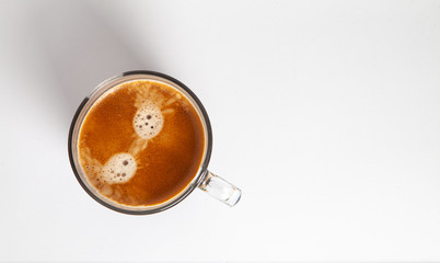 brewed coffee with foam in a glass mug Flavored coffee