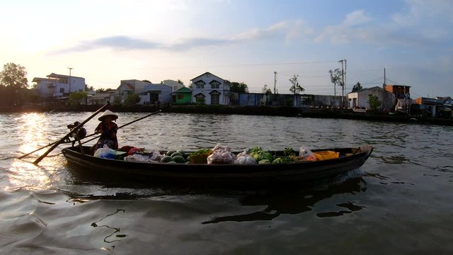 Vietnamese sunrise cruising up the Mekong river Vietnam 