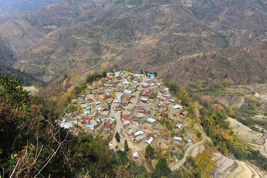 View across the slopes of the Naga hills and small Naga village, Phek district, Nagaland