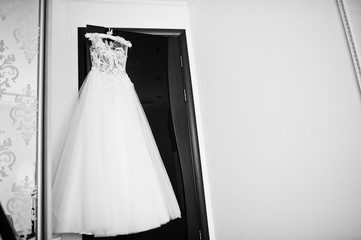 Elegant white wedding dress at bride morning.