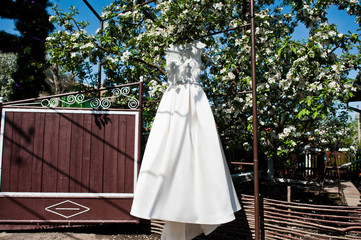 Elegant white wedding dress at bride morning.