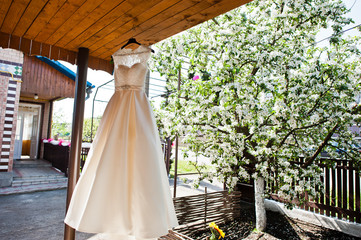 Elegant white wedding dress at bride morning.