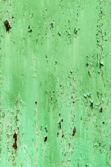 photo of metal with old paint. rust under the paint.