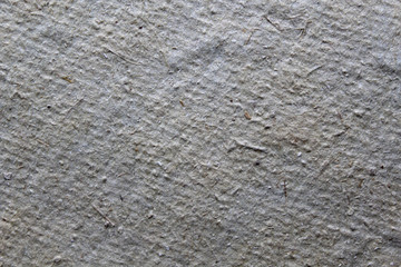 texture of dense cardboard sheet with plant fibers