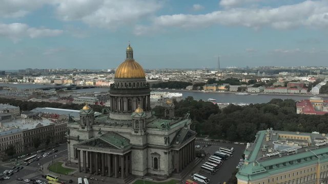 Majestic St. Isaac's Cathedral at dawn in the summer, aerial view. Panorama of the city center of St. Petersburg.