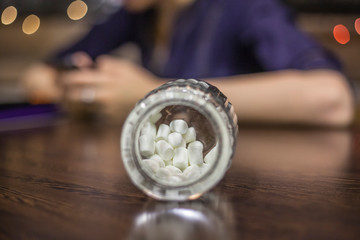 Sugar in a glass jar. Ingredient for a drink.
