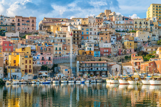 The colorful city of Sciacca overlooking its harbour. Province of Agrigento, Sicily.