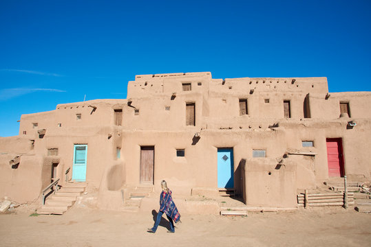 Woman visitor at Taos Pueblo, Taos, New Mexico