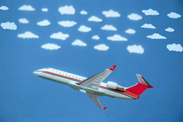 airplane with white clouds