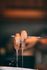 Hot donuts dripping glaze