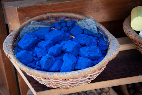 A beautiful basket of raw deep blue indigo in a market in Dubai