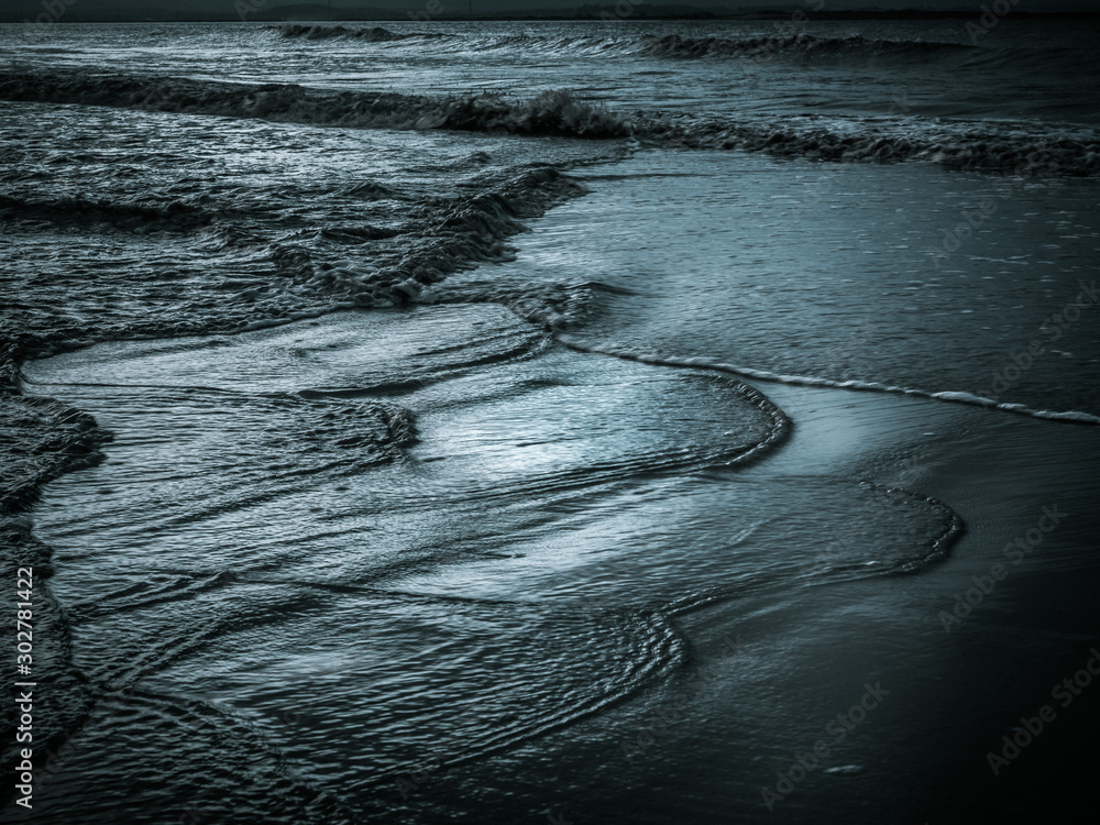 Wall mural abstract background water on a beach