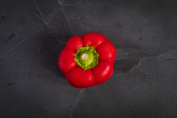 red peppers on grey slate table