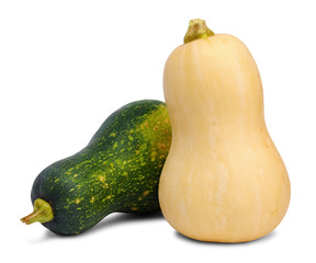 Two small green and yellow ripe pumpkins isolated on white background.