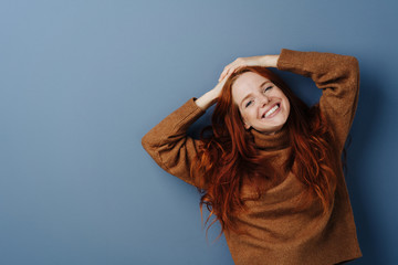 Happy carefree friendly young woman