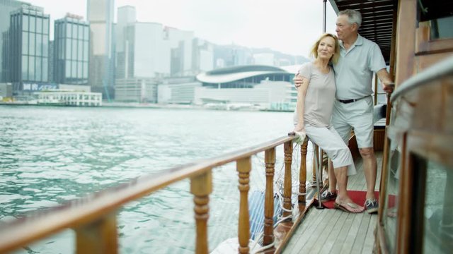 Mature loving couple on anniversary trip Hong Kong