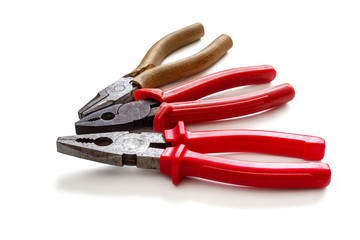 Pliers with insulated handles insulated on white background