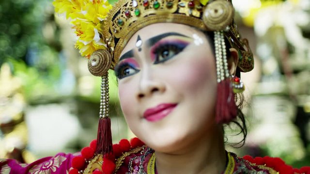 Portrait of female Indonesian spiritual Legong artistic dancer 