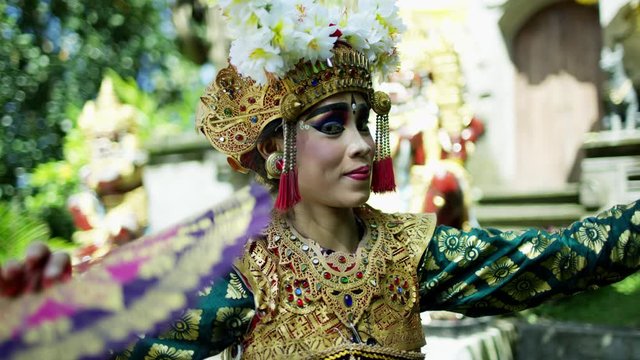 Portrait of female dancing wearing jewelled costume Indonesia