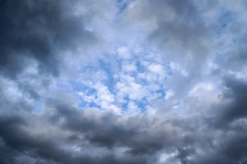 Beautiful white and grey clouds and cloud formations on a deep blue sky