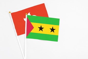Sao Tome And Principe and Hong Kong stick flags on white background. High quality fabric, miniature...