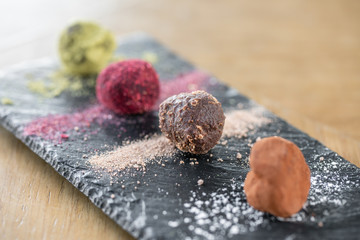 Candy chocolate truffle. Breakfast in the cafe, morning coffee. on wooden table. Restaurant menu