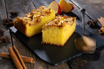 apple pie, apple and cinnamon pie. bakery products. pastries on the background of old boards.
