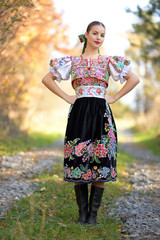 portrait of young woman in park