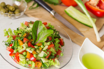 Fresh colorful vegetable salad in plate. Cooking healthy diet food