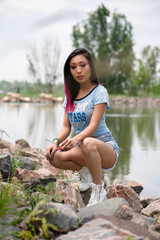 Beautiful asian girl posing in the American Independence Day