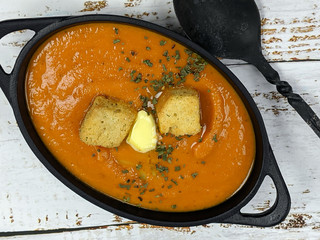 Overhead view of homemade Tomato and Carrot Soup