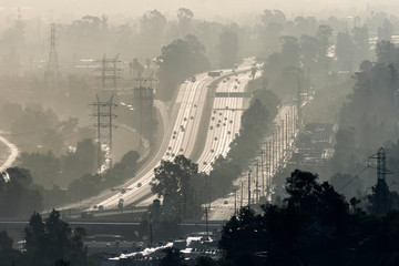 Hazy smoggy view of the 5 freeway near Riverside Drive, Griffith Park and the Los Angeles River in...