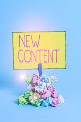 Text sign showing New Content. Business photo showcasing fresh valuable and relevant information or...
