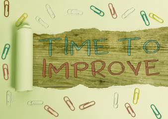 Writing note showing Time To Improve. Business concept for telling someone to develop himself Study...