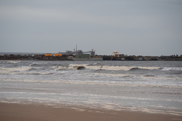 Rough Sea at ship loader, Port Latta. Overcast day. 