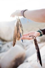 Hands And Feathers Shamanic Blessing in the desert. 