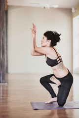 Fototapeta na wymiar Woman practicing yoga.