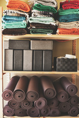 Yoga studio blocks, mats, blankets and other props. 