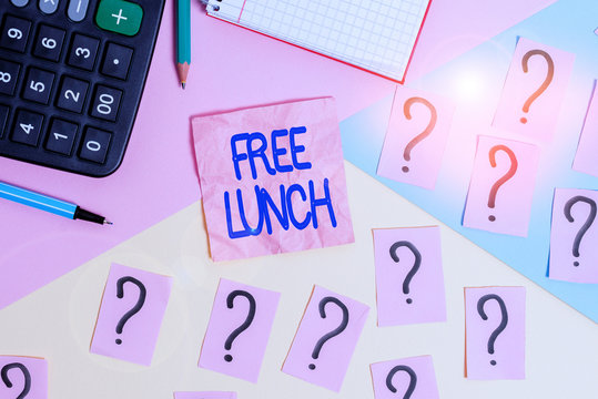 Handwriting text Free Lunch. Conceptual photo something you get free that you usually have to work or pay for Mathematics stuff and writing equipment above pastel colours background
