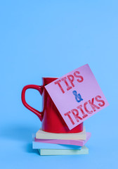 Conceptual hand writing showing Tips And Tricks. Concept meaning Steps Lifehacks Handy advice...