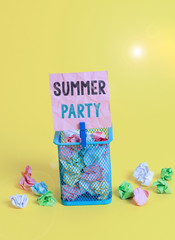 Handwriting text writing Summer Party. Conceptual photo social gathering held during summer season or school break Trash bin crumpled paper clothespin empty reminder office supplies yellow