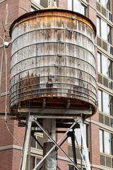 Leaking rooftop wooden water tower