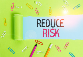 Word writing text Reduce Risk. Business photo showcasing lessen the potential damage that could be...