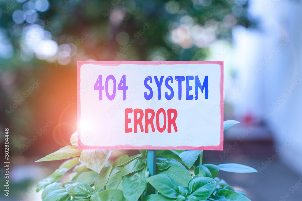 Fototapete Text sign showing 404 System Error. Business photo text message appears when website is down and cant be reached Plain empty paper attached to a stick and placed in the green leafy plants