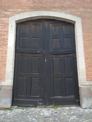 old wooden door in wall