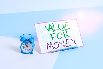 Handwriting text writing Value For Money. Conceptual photo reference to something is well worth the money spent on it Mini size alarm clock beside a Paper sheet placed tilted on pastel backdrop