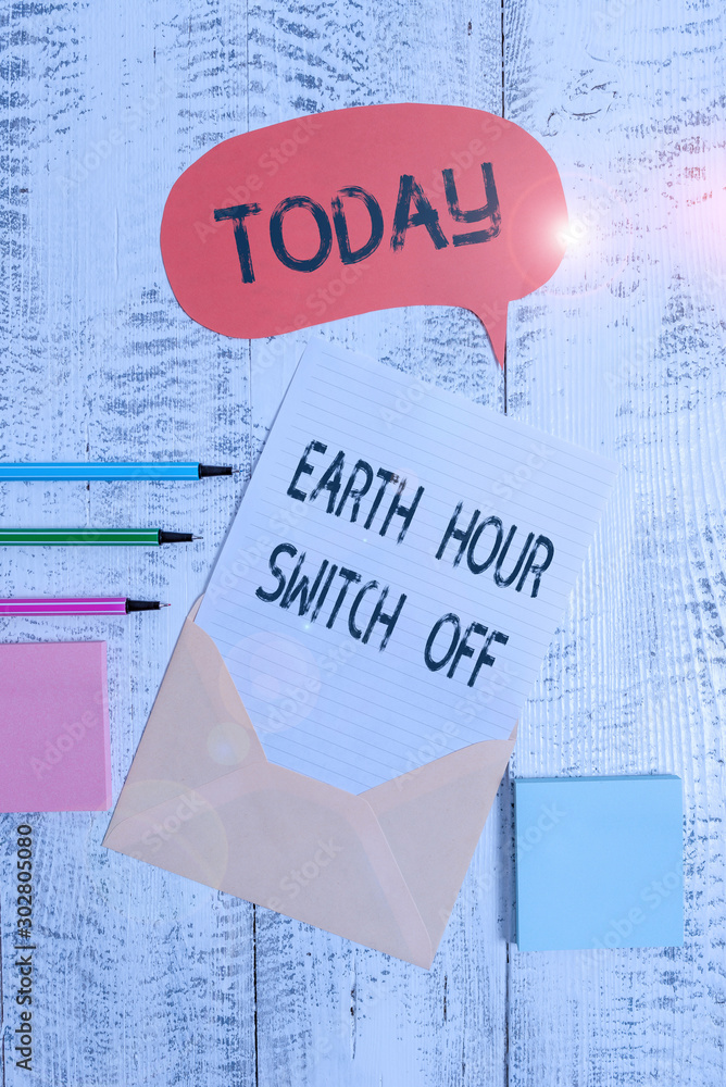 Aufkleber writing note showing earth hour switch off. business concept for the lights out event annual movemen