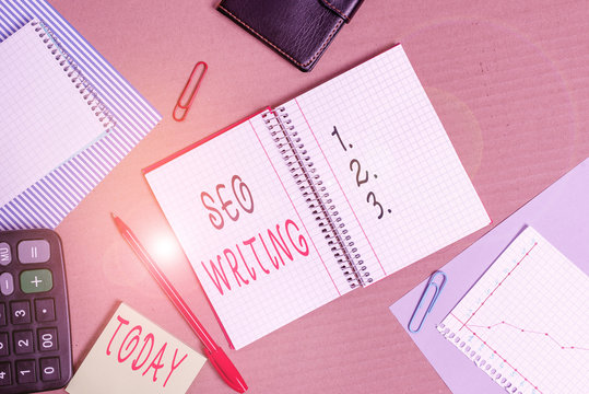 Text sign showing Seo Writing. Business photo showcasing grabbing the attention of the search engines using specific word Striped paperboard notebook cardboard office study supplies chart paper