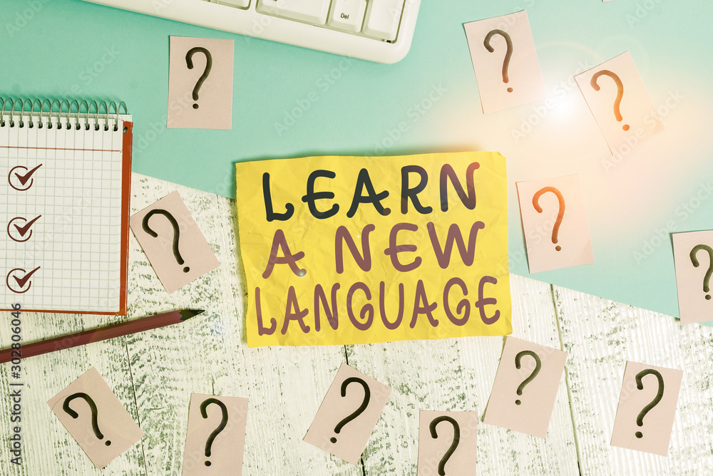 Poster writing note showing learn a new language. business concept for study words other than the native mo